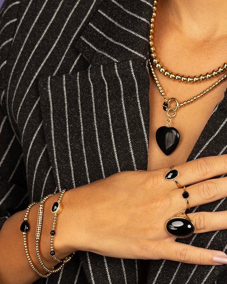 Onyx hart armband goud