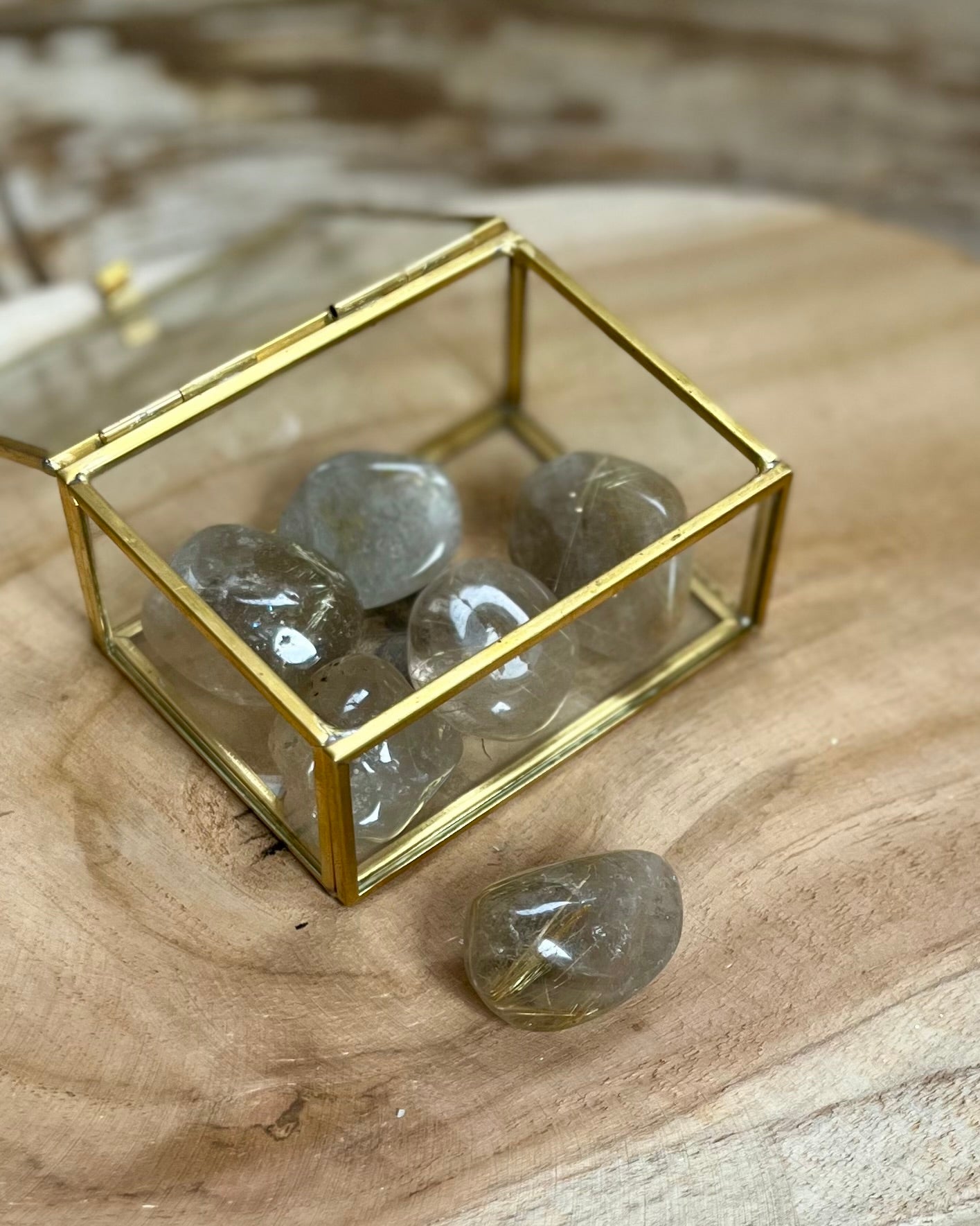 Rutilated quartz tumbled stone