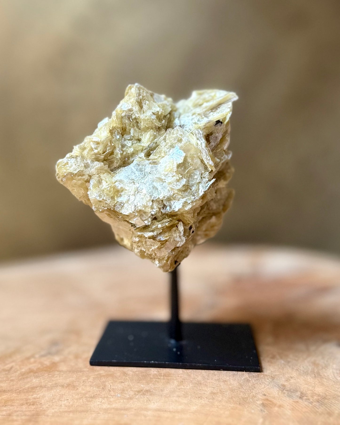 Gouden Mica op standaard
