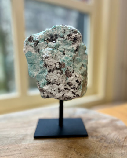 Large raw Amazonite on stand