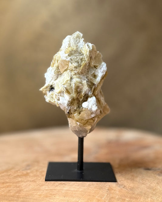 Gouden Mica op standaard