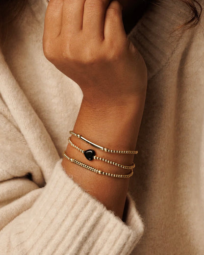 Onyx hart armband goud