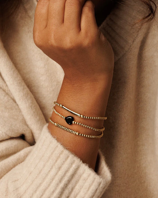 Onyx hart armband goud