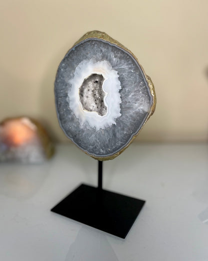 Agate geode on stand