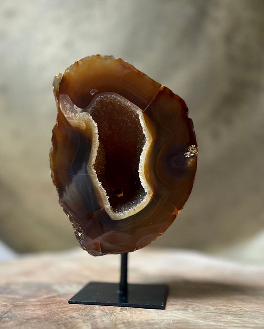 Agate geode on stand