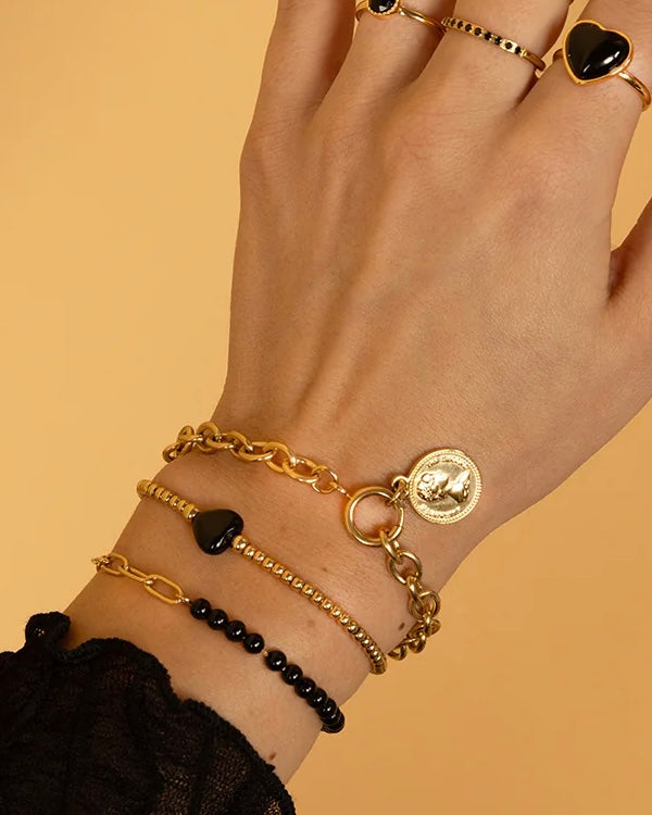 Onyx hart armband goud