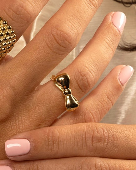 Gouden ring met strik