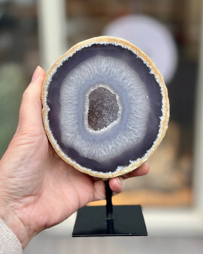 Agate geode on stand