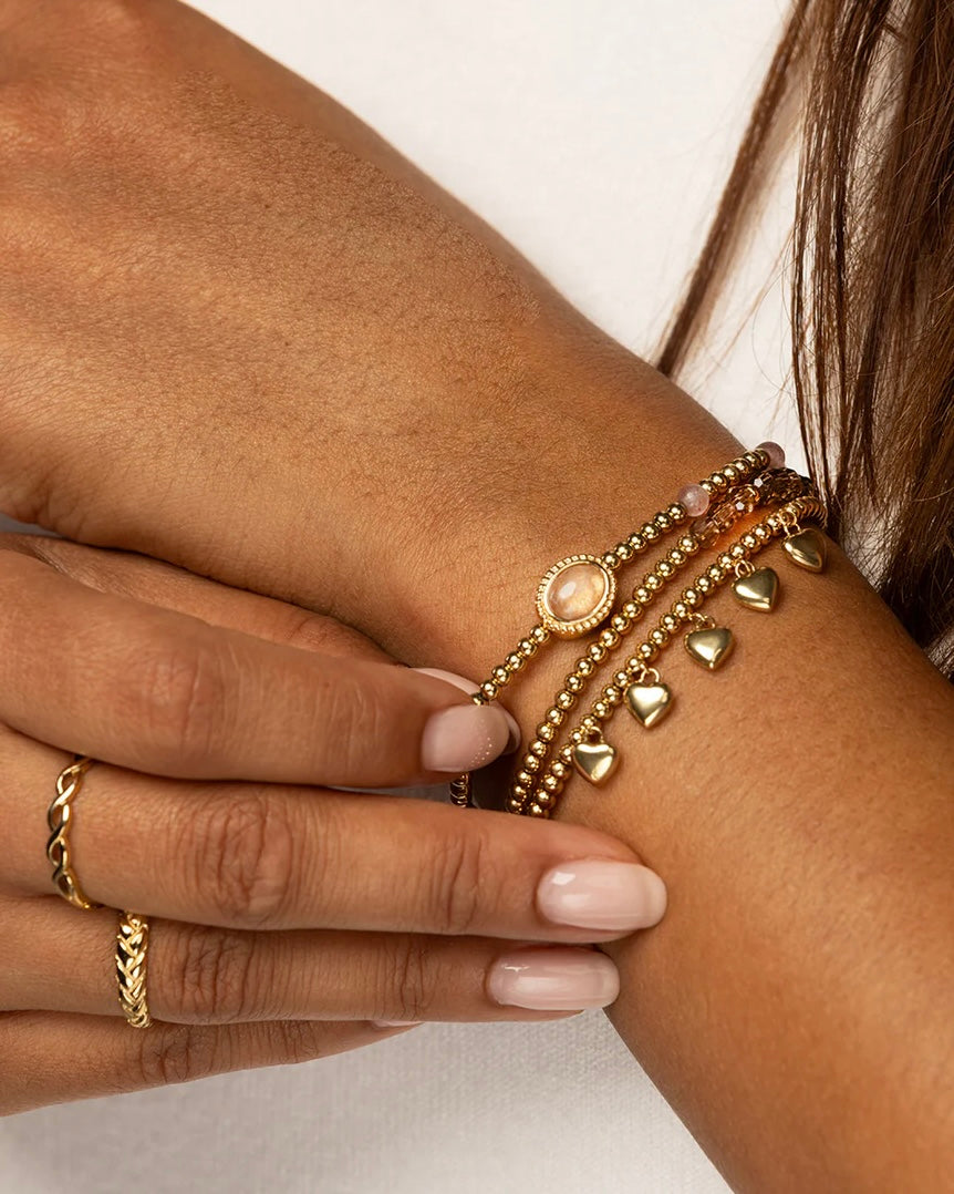 Bedelarmband hartjes goud