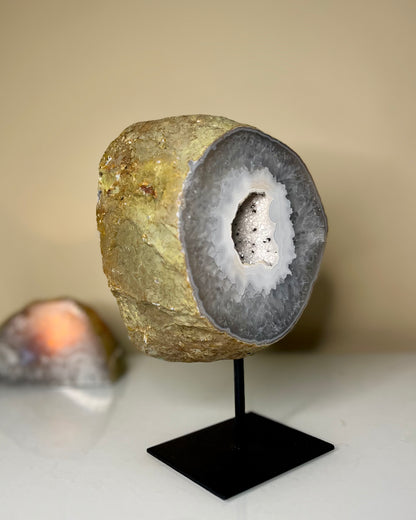 Agate geode on stand